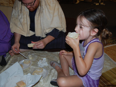 Annie enjoys hot bread with fresh butter.jpg